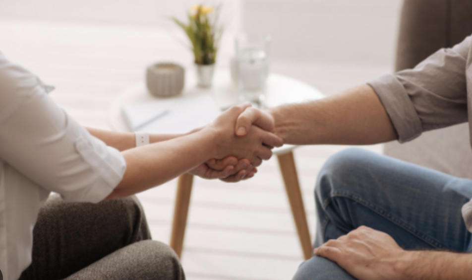 two people holding hands